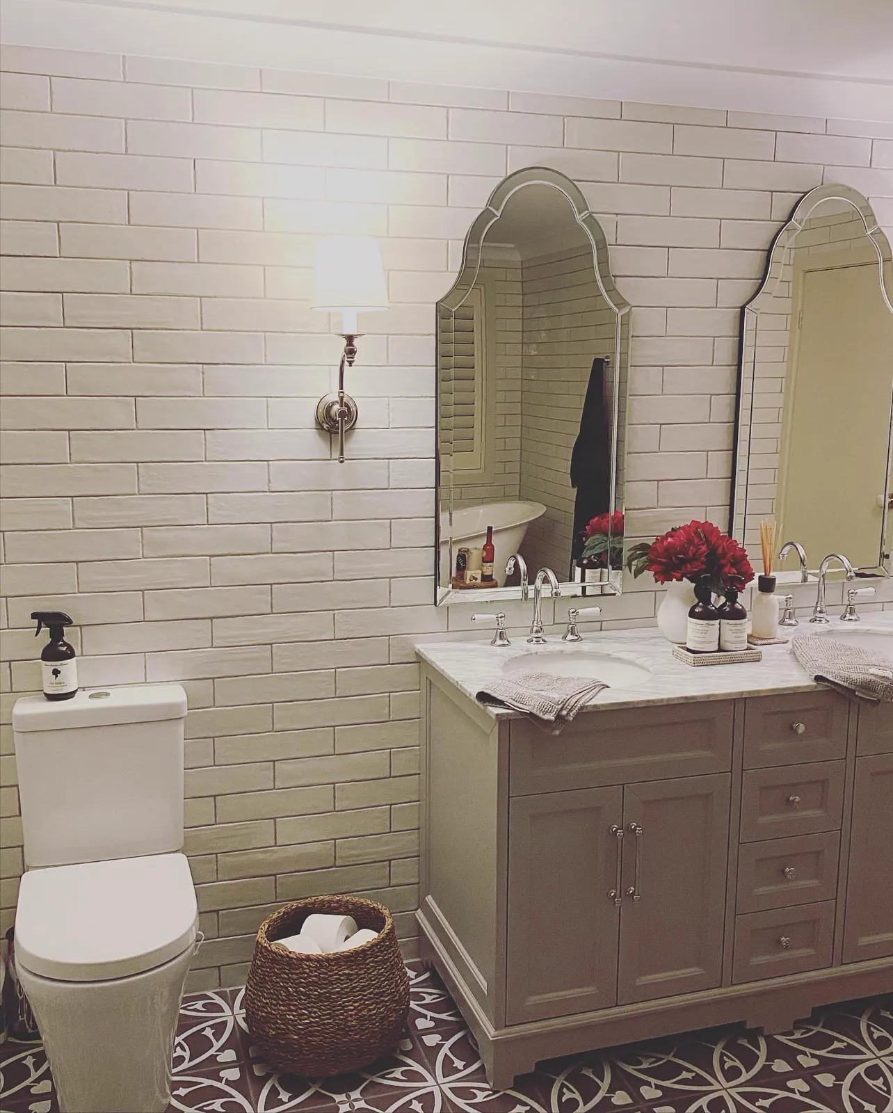 Renovated bathroom with subway tiles, marble double vanity and arched mirrors, Northern Beaches